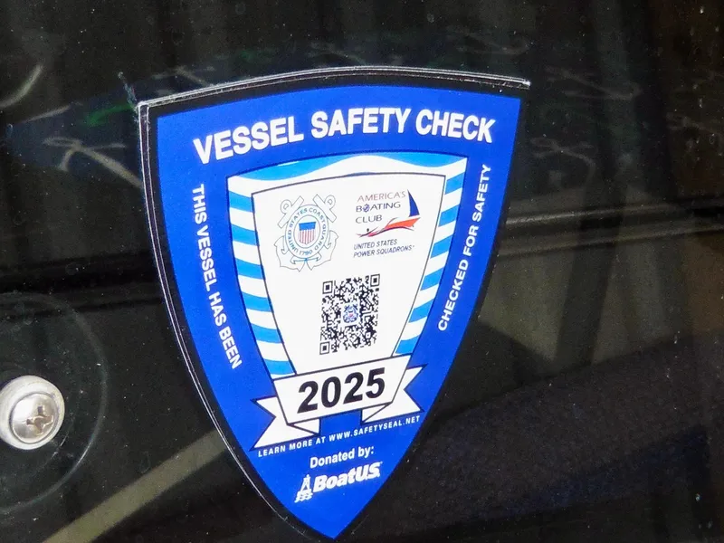 Slide: The Image of 2025 Vessel Safety Check sticker on 1992 Bayliner 3288 Motoryacht, indicating safety compliance. - 6