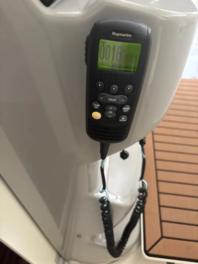 Slide: The Image of Raymarine radio on 2017 Boston Whaler 420 Outrage boat, mounted on white panel. - 25