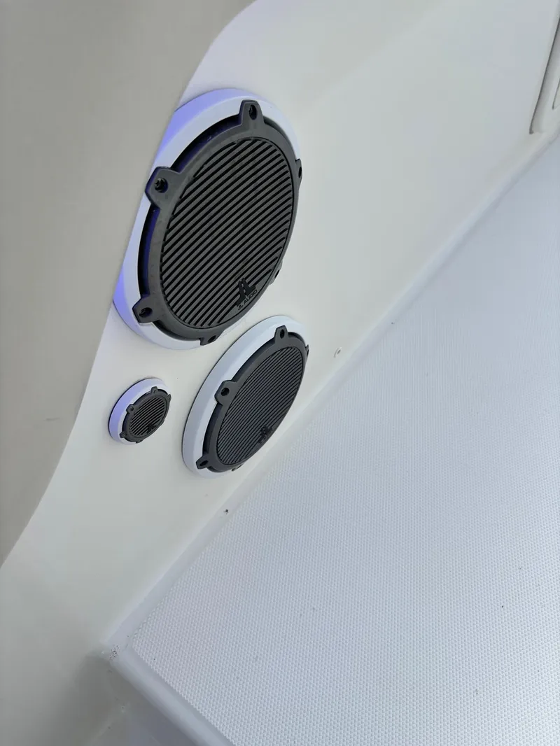 Slide: The Image of Speakers on a 2017 Boston Whaler 420 Outrage boat, mounted on a white surface. - 42