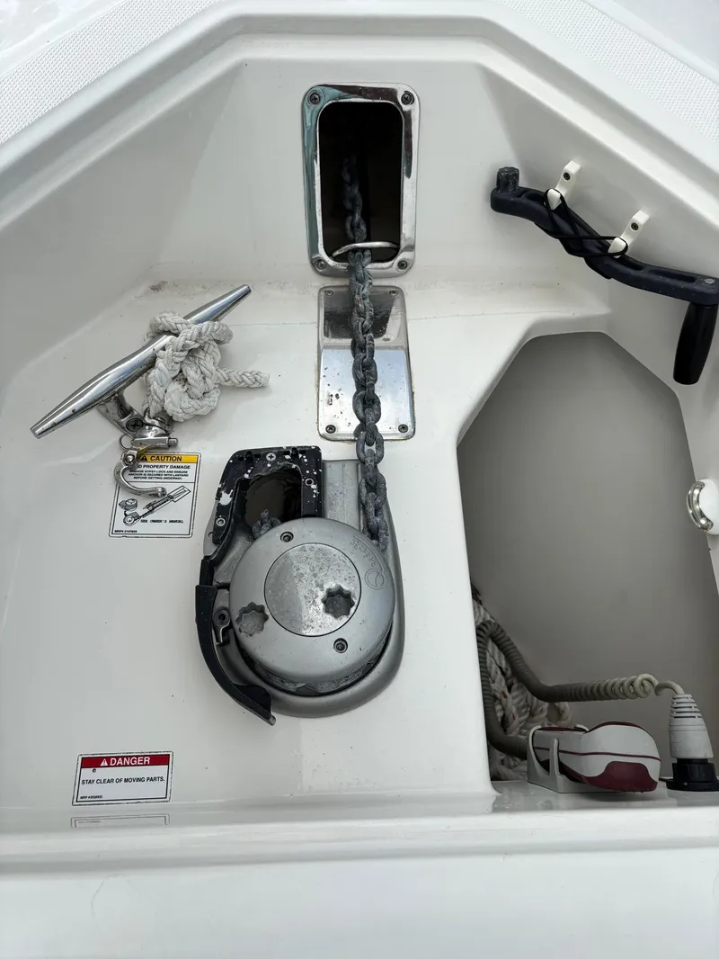 Slide: The Image of Anchor chain and winch system on a 2017 Boston Whaler 420 Outrage boat. - 44