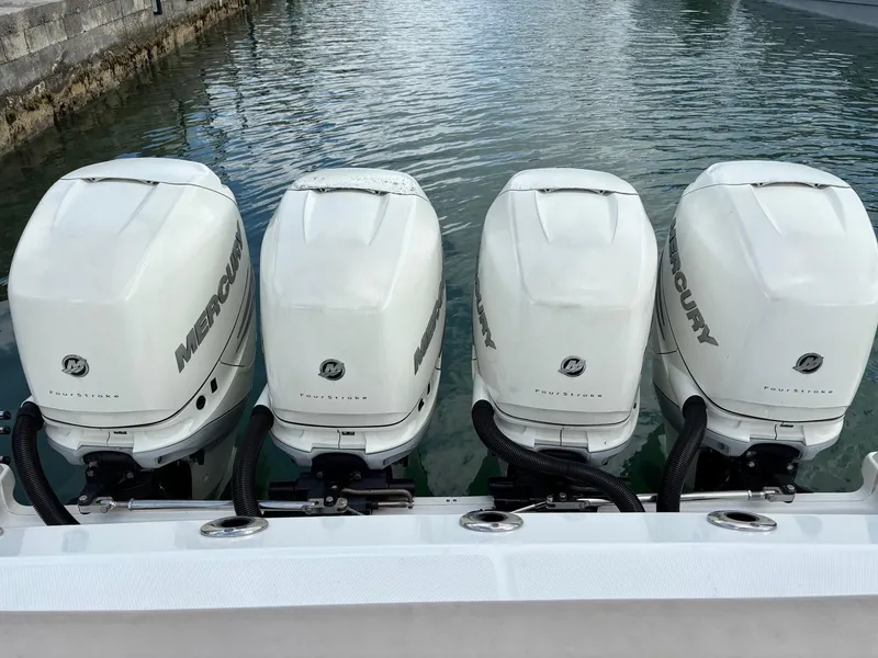 Slide: The Image of Four Mercury outboard engines on a 2017 Boston Whaler 420 Outrage boat. - 45