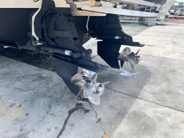 Slide: The Image of Propellers of a 2016 Sea Ray 350 SLX boat on a concrete surface. - 25