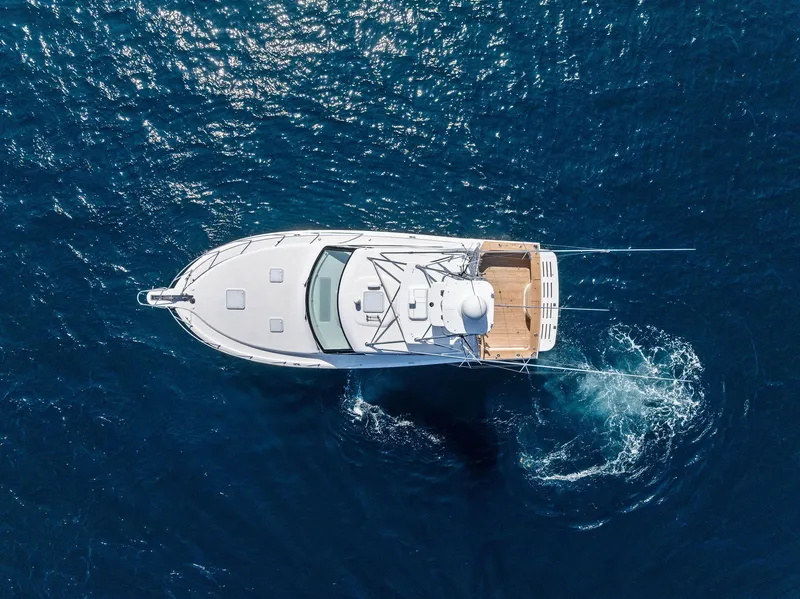 Slide: The Image of Aerial view of 2016 Hatteras Express Sportfish yacht cruising in deep blue ocean. - 17