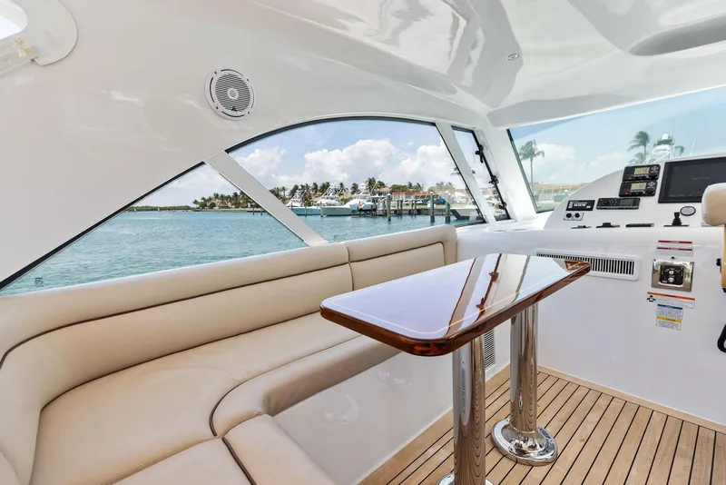 Slide: The Image of Interior of 2016 Hatteras 45 Express Sportfish with water view. - 50