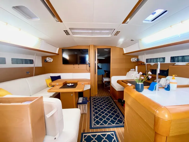 Slide: The Image of Luxurious interior of 2016 Jeanneau Sun Odyssey 479 yacht with modern amenities and elegant design. - 1