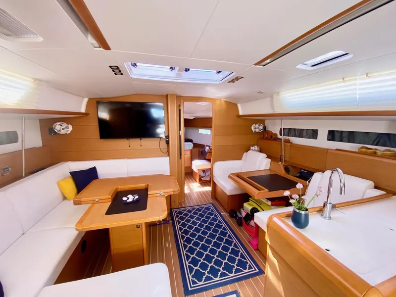 Slide: The Image of Interior of 2016 Jeanneau Sun Odyssey 479 yacht with modern furnishings and elegant design. - 21