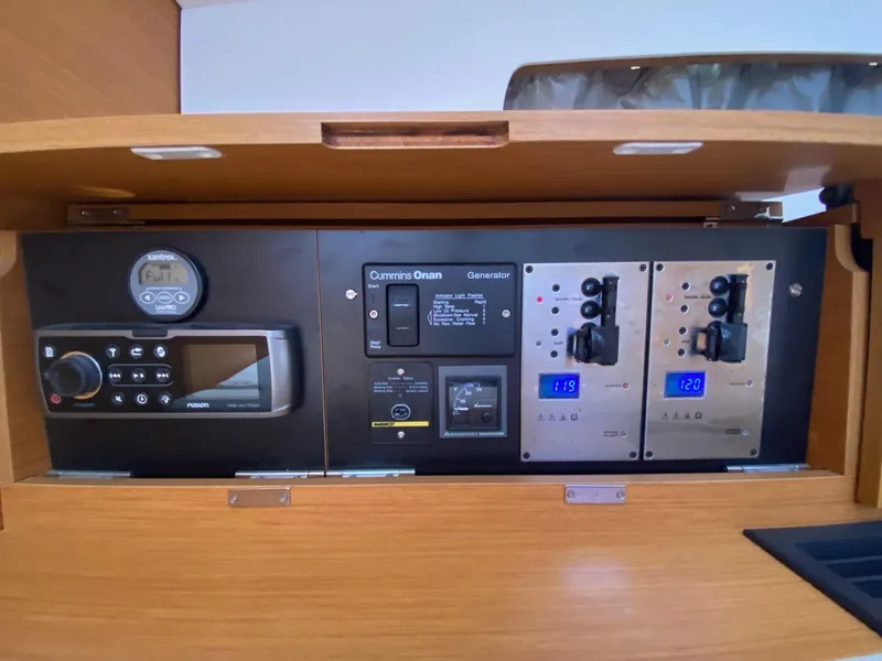 Slide: The Image of Control panel of 2016 Jeanneau Sun Odyssey 479 yacht with generator and electrical systems. - 26