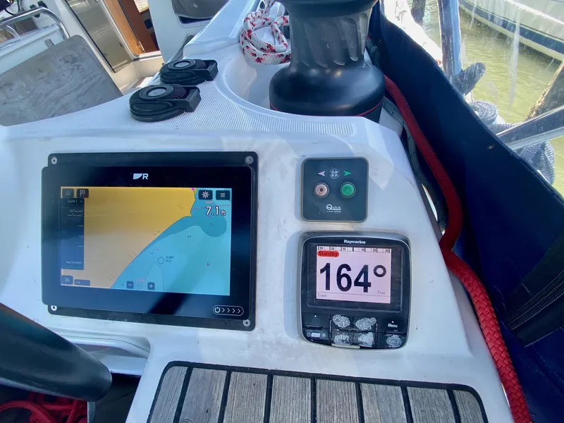 Slide: The Image of Navigation instruments on a 2016 Jeanneau Sun Odyssey 479 sailboat cockpit. - 29