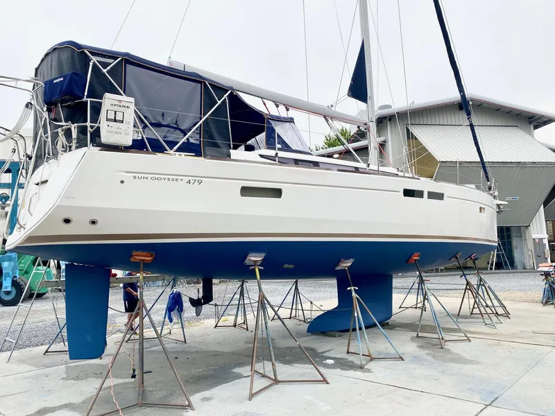 Slide: The Image of 2016 Jeanneau Sun Odyssey 479 sailboat on stands in a boatyard. - 42