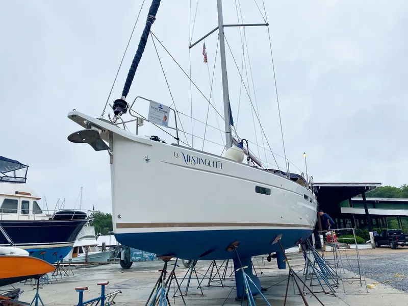 Slide: The Image of 2016 Jeanneau Sun Odyssey 479 sailboat on dry dock, side view. - 43