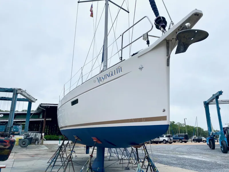 Slide: The Image of 2016 Jeanneau Sun Odyssey 479 sailboat on stands in a boatyard. - 44