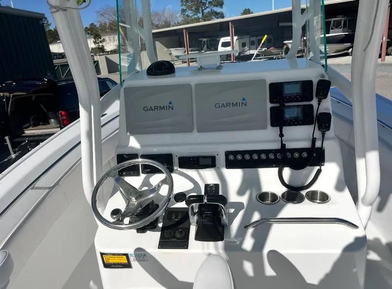 Slide: The Image of 2019 Cape Horn 31 boat console with Garmin navigation system and steering wheel. - 3