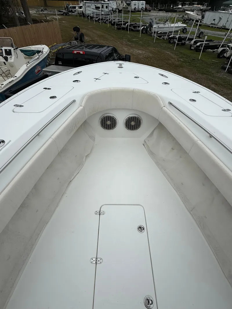 Slide: The Image of 2019 Cape Horn 31 boat interior with storage compartments and seating. - 9