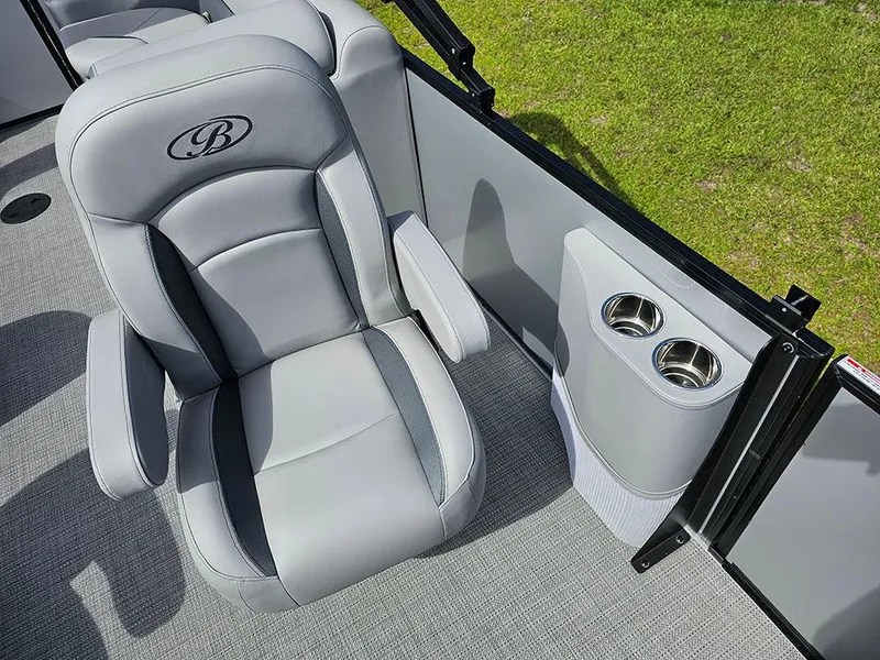 Slide: The Image of 2025 Bentley Pontoons Legacy 243 Navigator interior with gray seating and spacious layout. - 16