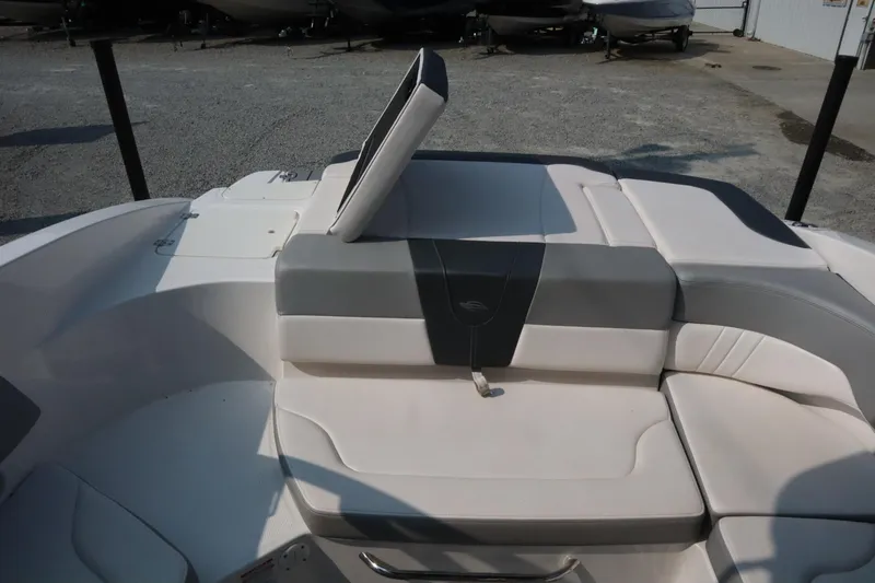 Slide: The Image of 2020 Chaparral 23 SSi boat interior with white and gray seating. - 12
