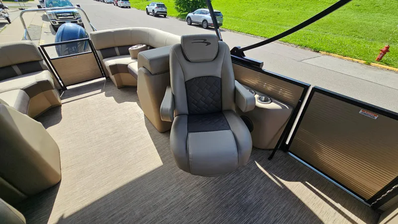 Slide: The Image of 2021 Bennington L 22 Quad Bench interior with luxurious seating and modern design. - 13