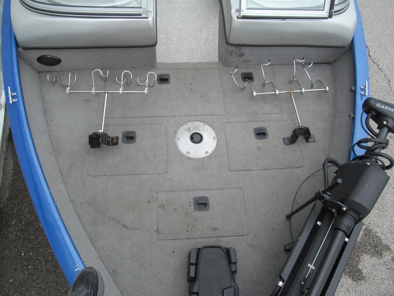 Slide: The Image of 2011 Tracker Pro Guide V-16 WT boat deck with rod holders and trolling motor. - 11