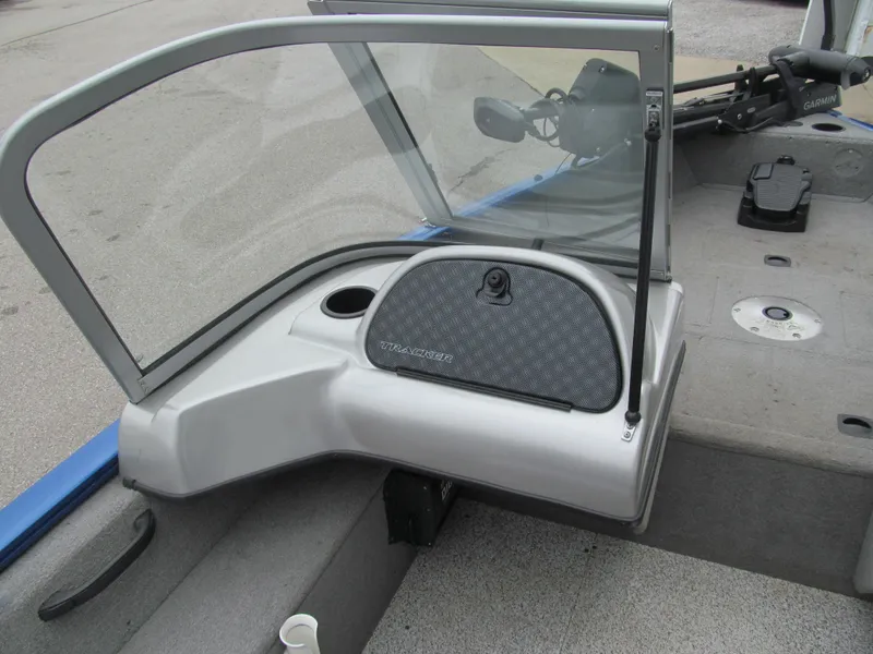 Slide: The Image of 2011 Tracker Pro Guide V-16 WT boat interior with windshield and storage compartment. - 7