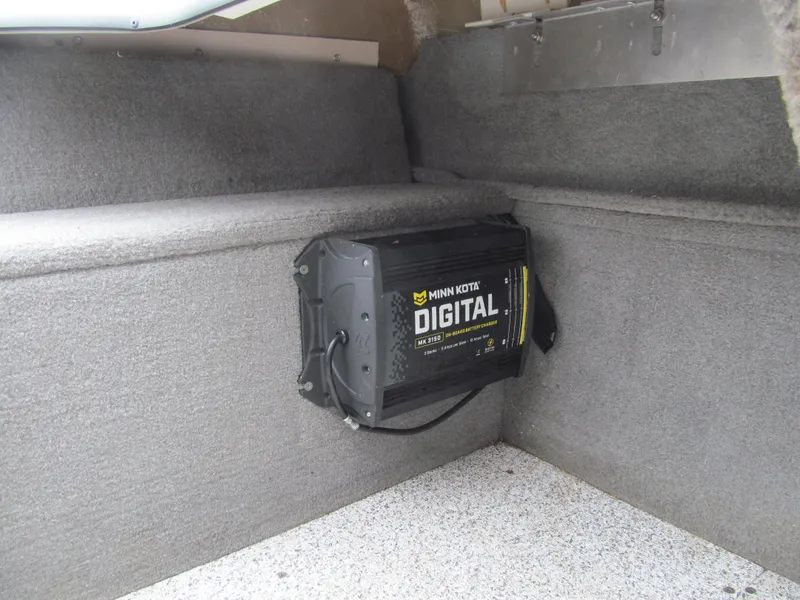 Slide: The Image of Minn Kota digital battery charger in 2011 Tracker Pro Guide V-16 WT boat. - 8