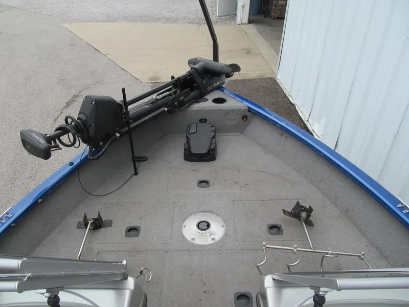 Slide: The Image of 2011 Tracker Pro Guide V-16 WT boat deck with Garmin trolling motor. - 9