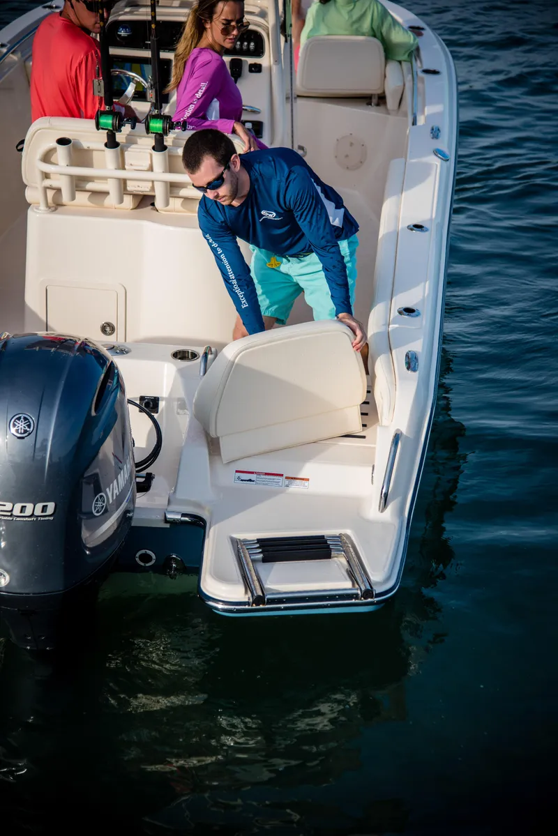 Slide: The Image of 2026 Grady-White Fisherman 216 boat with passengers, Yamaha engine, on water. - 10