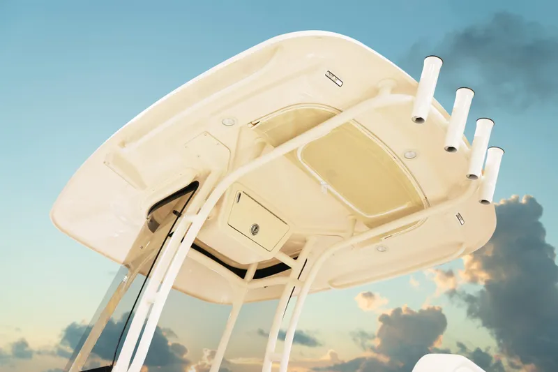 Slide: The Image of 2026 Grady-White Fisherman 216 boat top view against a cloudy sky. - 9