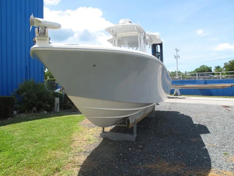 Slide: The Image of 2020 SeaVee 290B boat on display, front view, outdoors, sunny day. - 3