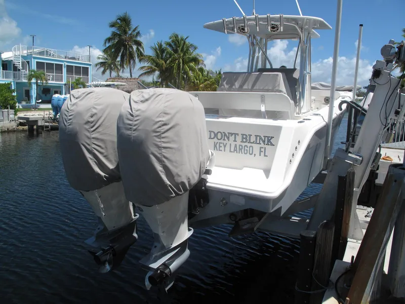 Slide: The Image of 2020 SeaVee 290B boat docked in Key Largo, Florida with twin engines. - 5