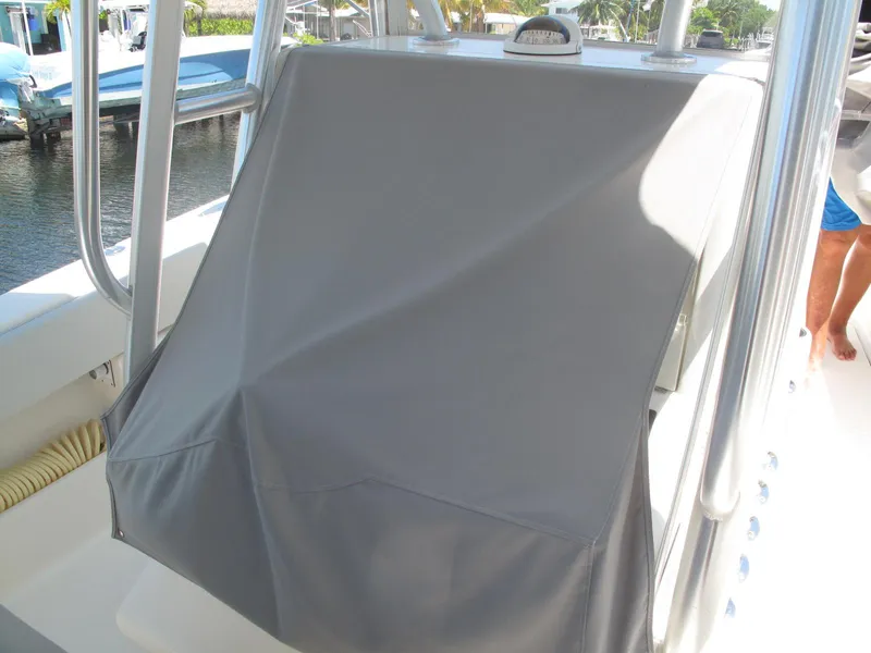 Slide: The Image of 2020 SeaVee 290B boat console covered with a protective gray cover. - 7