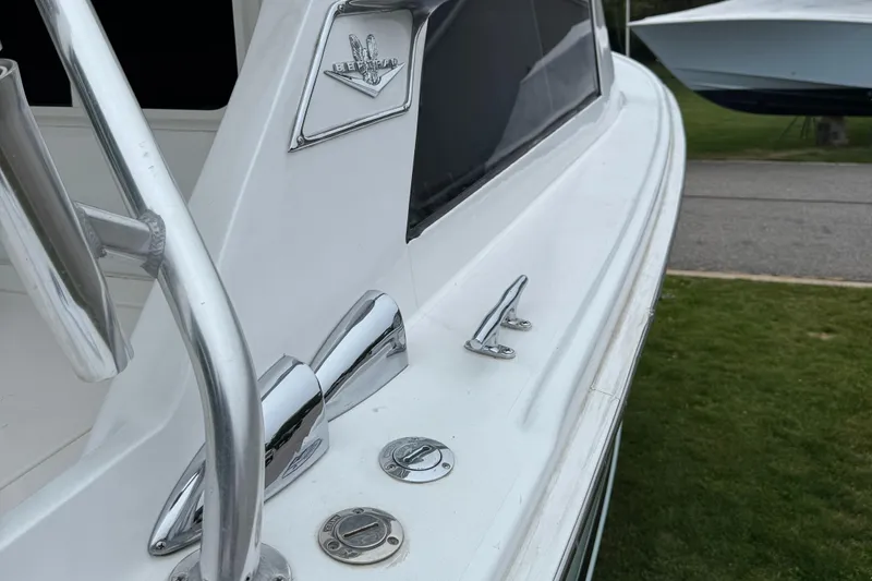 Slide: The Image of 1964 Bertram 31 Flybridge Cruiser, close-up of deck and chrome fittings. - 16