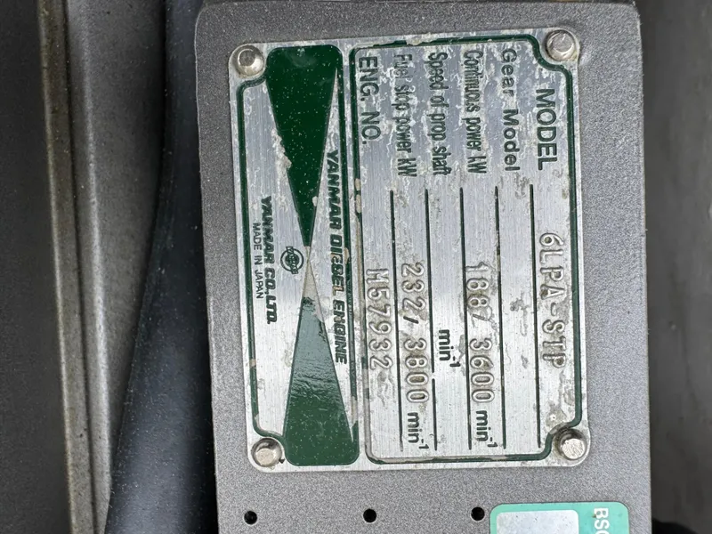 Slide: The Image of Plaque of Yanmar diesel engine on 1964 Bertram 31 Flybridge Cruiser, model 6LPA-STP. - 7