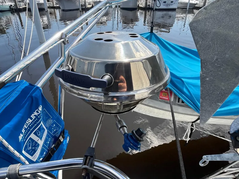 Slide: The Image of Stainless steel grill on a 1999 Catalina 42 MkII sailboat deck. - 23