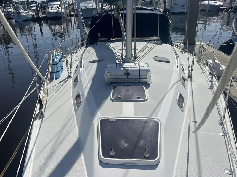 Slide: The Image of 1999 Catalina 42 MkII sailboat deck view at marina. - 35