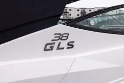 Slide: The Image of 2020 Cruisers Yachts 38 GLS logo on sleek white hull. - 10