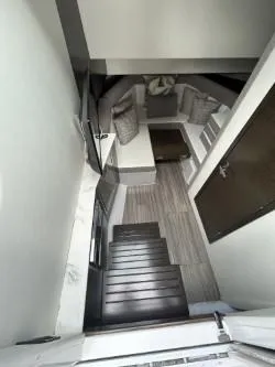 Slide: The Image of Interior view of 2020 Cruisers Yachts 38 GLS, featuring modern seating and sleek design. - 21