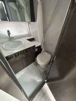 Slide: The Image of 2020 Cruisers Yachts 38 GLS bathroom with modern fixtures and compact design. - 23