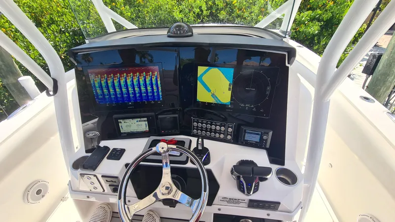 Slide: The Image of 2021 Sea Fox 328 Commander dashboard with advanced navigation and control systems. - 14