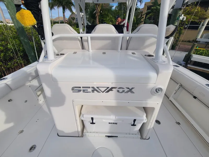 Slide: The Image of 2021 Sea Fox 328 Commander boat interior with seating and storage. - 21
