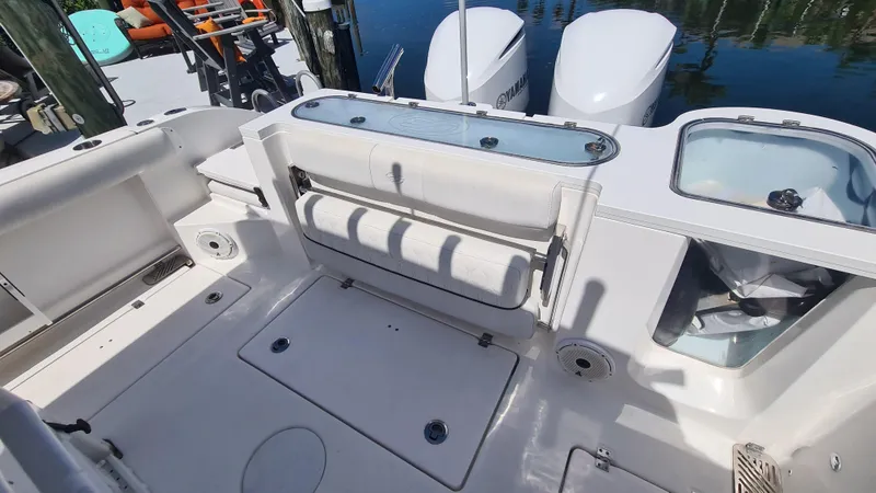 Slide: The Image of 2021 Sea Fox 328 Commander boat interior with seating and Yamaha engines. - 24