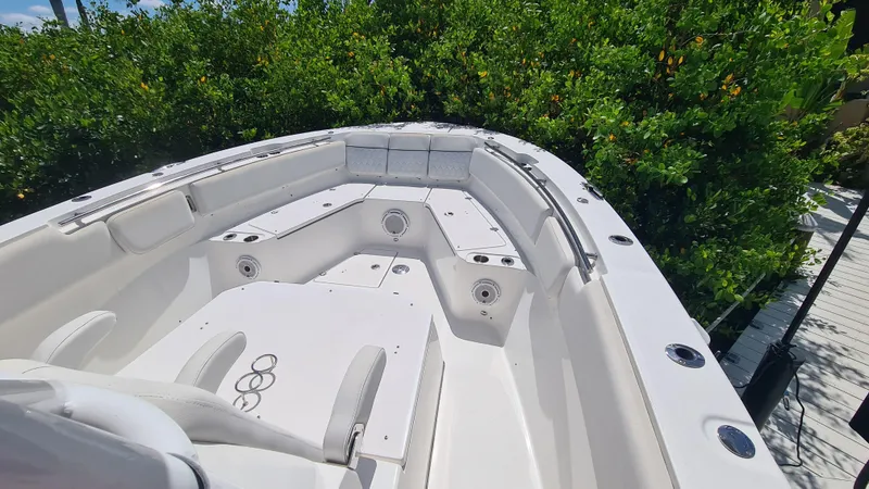 Slide: The Image of 2021 Sea Fox 328 Commander boat interior with seating and storage compartments. - 7