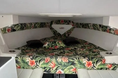 Slide: The Image of 2021 Velocity 290 SC cabin with tropical floral upholstery and modern design. - 19