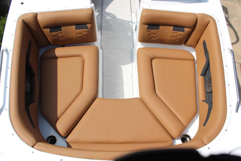 Slide: The Image of 2025 Four Winns HD3 OB boat with tan leather seating and modern design. - 12