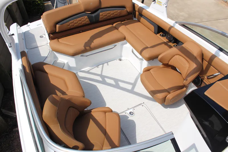 Slide: The Image of 2025 Four Winns HD3 OB boat interior with luxurious tan seating and spacious layout. - 3