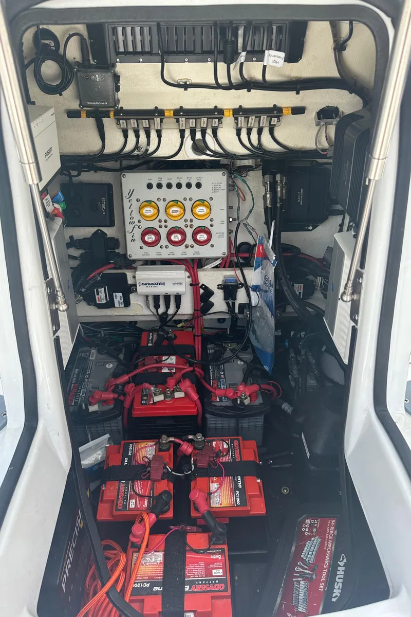Slide: The Image of 2020 Yellowfin 26 Hybrid boat electrical system with batteries and wiring. - 11