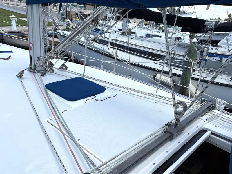 Slide: The Image of Sailboat deck of 1998 Catalina 34 MkII with rigging and marina background. - 5