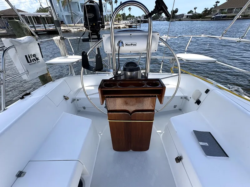 Slide: The Image of Cockpit of 1998 Catalina 34 MkII sailboat with steering wheel and navigation equipment. - 7