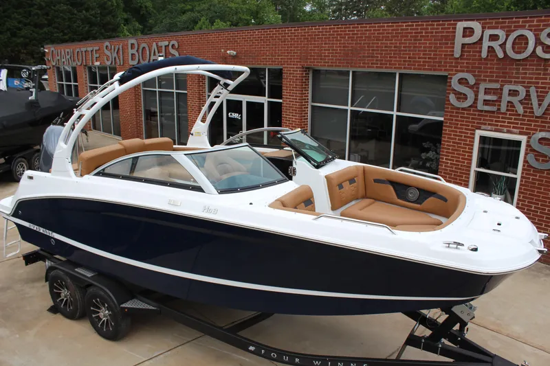 The Image of 2025 Four Winns HD3 OB boat with sleek design, displayed at Charlotte Ski Boats dealership. - 1