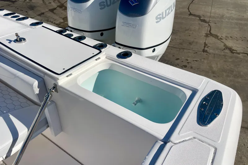 Slide: The Image of 2021 Stamas 31 Adventura boat with Suzuki engines and livewell on deck. - 20