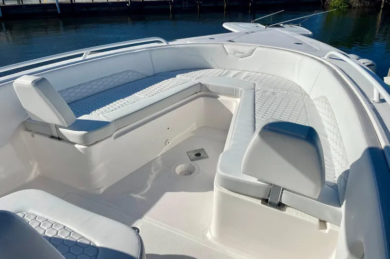 Slide: The Image of 2021 Stamas 31 Adventura boat with spacious white seating area. - 7
