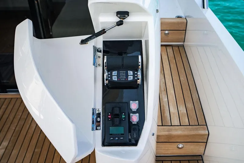 Slide: The Image of Control panel of a 2021 Princess S62 yacht with teak flooring. - 14